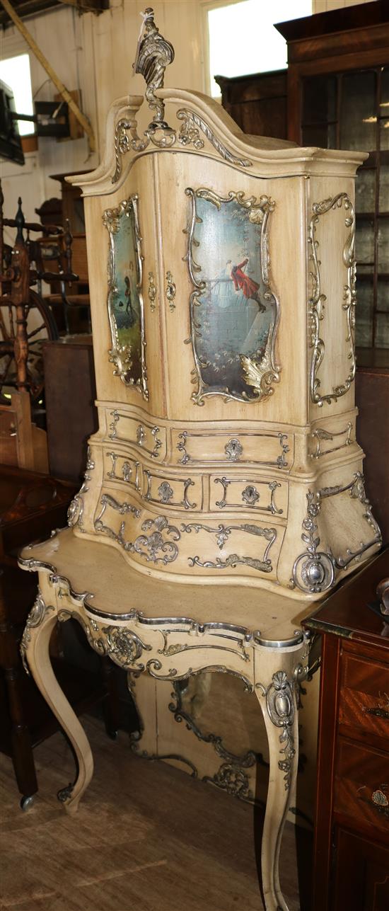 A late 19th century Italian cream painted cabinet on stand
